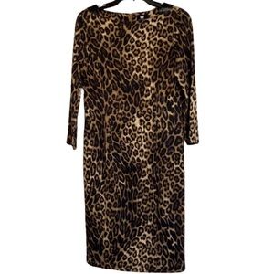 W by Worth 3/4 length sleeve mini dress with black leather accent on shoulders.